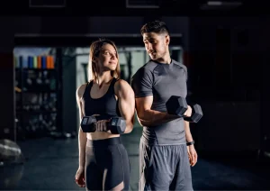 Image of gym members lifting weights