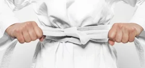 Image of a white Taekwondo belt representing one of the Taekwondo belt levels and ranking system