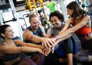 Image of gym members laughing together