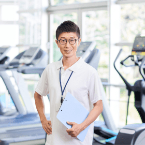 Image of personal trainer using personal training software